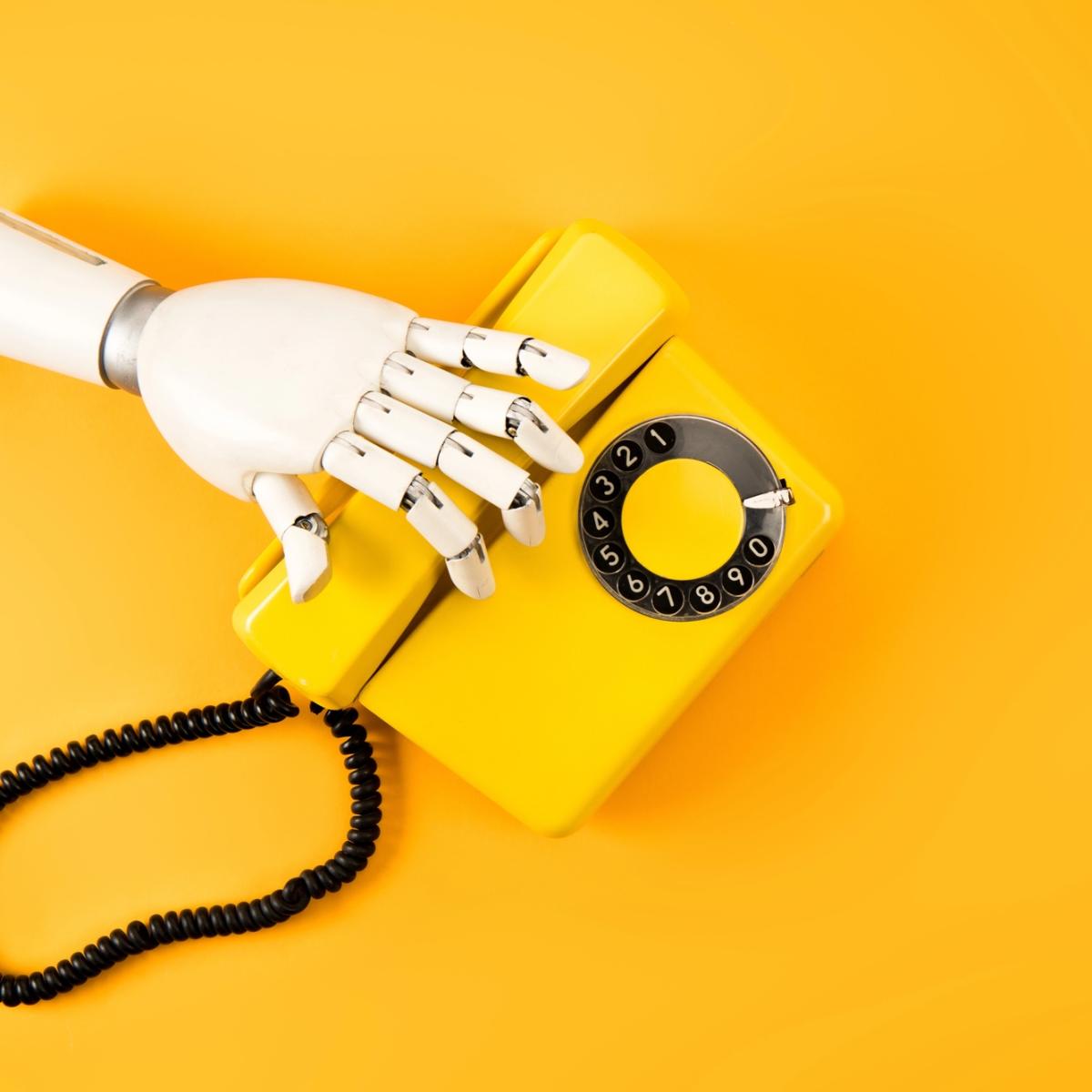Robot Hand holding phone